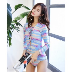 insidemydaydream:Gorgeous Korean-style surf swimwear, surf bikinis and rashguards from Petite Cherry. Love the colorfulness and lace-up front on this piece! 🌊 SHOP NOW with FREE Shipping