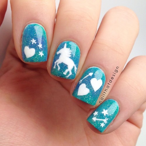 nailpornography: nailthatdesign: I did these super cute unicorn x random doodles nails inspired by @