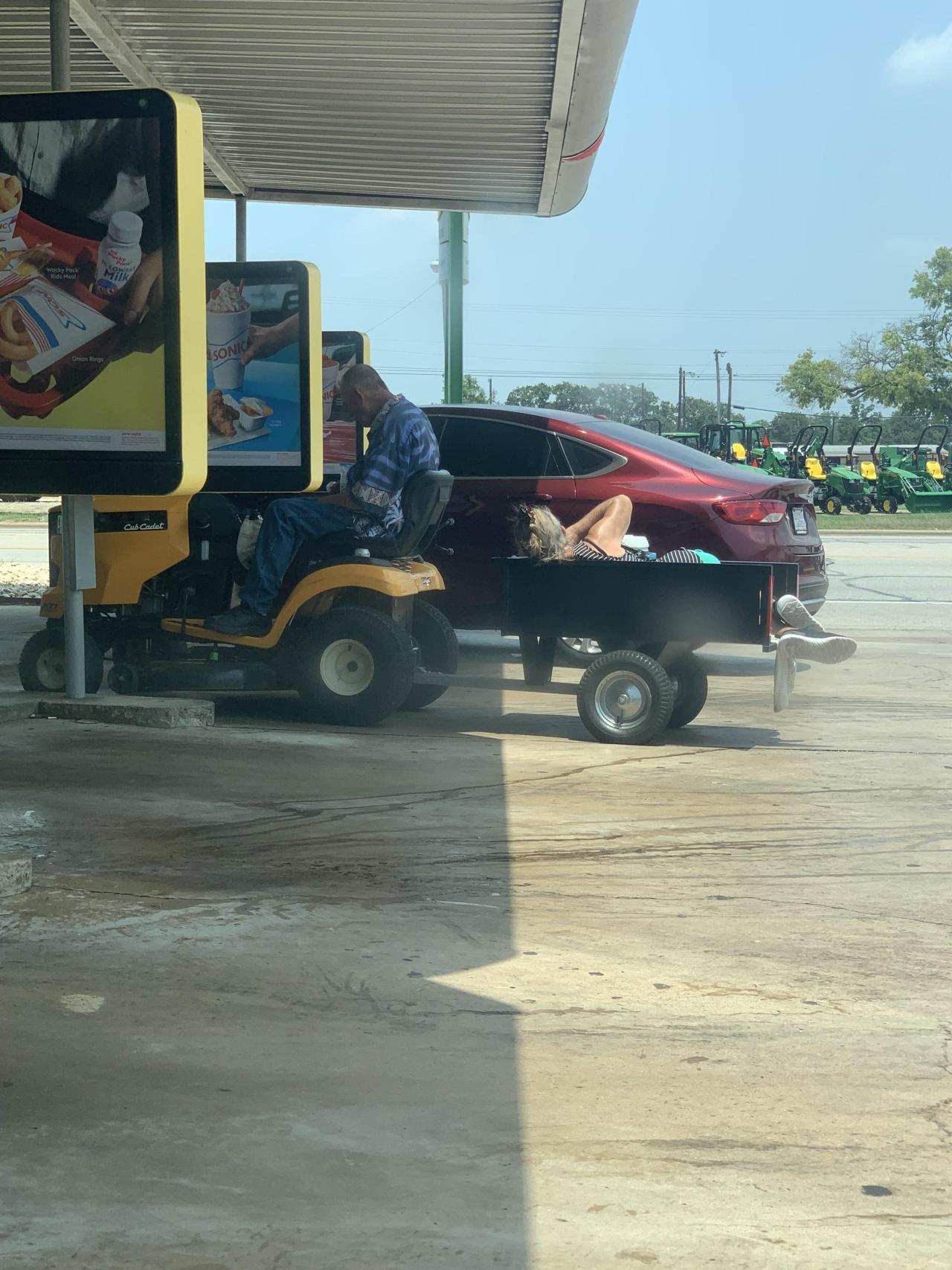 This man towed his wife to sonic on a lawnmower to get a vanilla ice cream cone #This man towed his wife to sonic on a lawnmower to get a vanilla ice cream cone