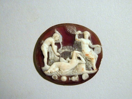 Ancient Greek or Roman sardonyx cameo depicting a group of Bacchic devotees.  Artist unknown; 1st ce