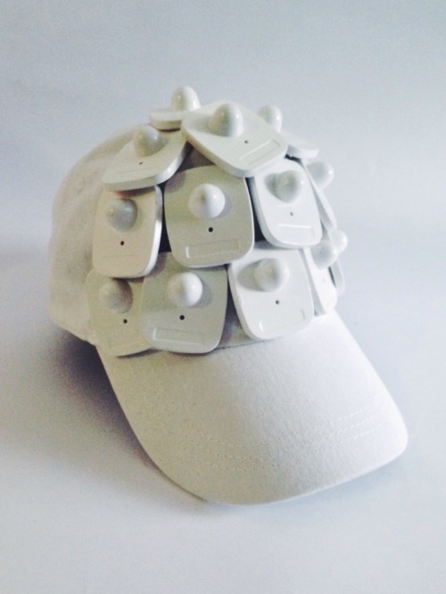 schuhtutehemd:  security tag cap (that sets the alarms in stores off) from my S/S 14 grad collection 