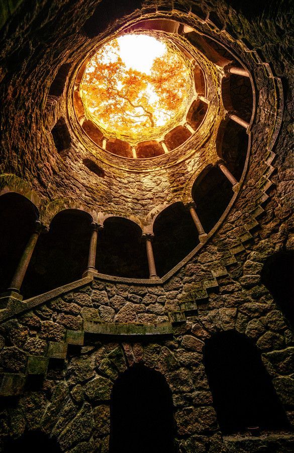 Climb into the light (stairway to a tower turret in Quinta de Regaleira, a World