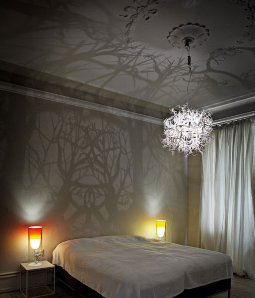 sixpenceee:  GUYS GUYS GUYS A CHANDELIER THAT TURNS A ROOM INTO A CREEPY FOREST 