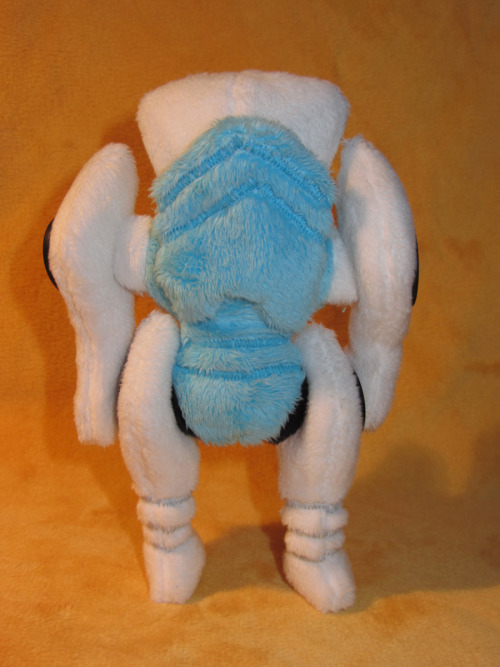 manicscribble:  katyamola:  momoless:  Mini Tailgate is only 6 inch tall and his arms and legs are movable thanks to button-joints. He is out of minky with embroidered on details and buttons. Since he is my first try he came out a bit wonky, but he still