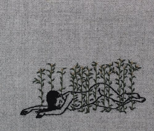 Hand embroidery on natural linen.