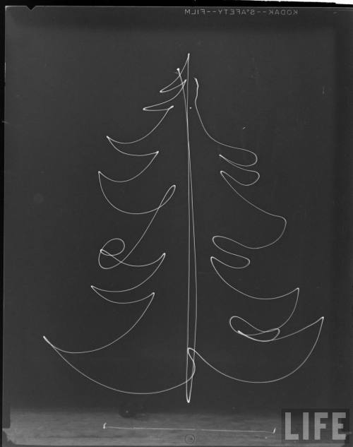 electronicsquid:  Drawing a Christmas tree with a light source(Gjon Mili. n.d.)