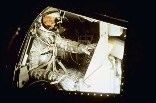 NASA&rsquo;s Mercury astronaut, John Glenn sits inside a training capsule on January 11th, 1961,