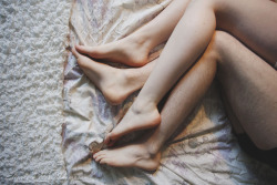 pancakesinthemountains:  Perfect feeling when her feet press down on top of mine.