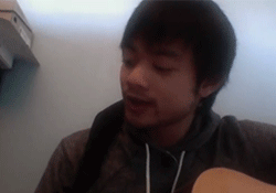 in-the-truly-grusome-do-we-trus:  Osric Chau attempting and failing somwhere in the middle to play / sing the adventure time theme 