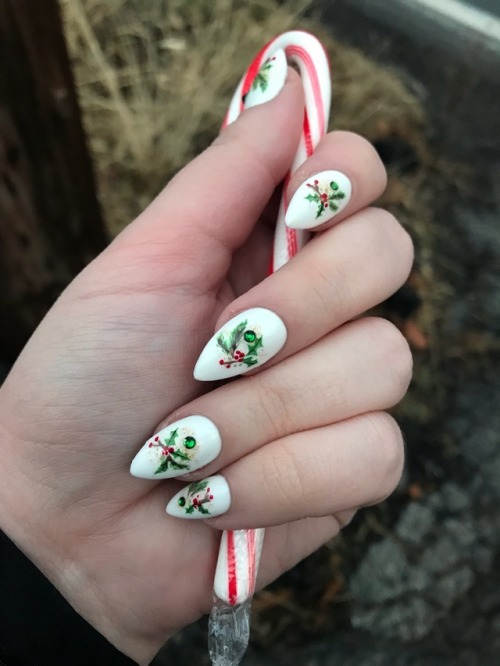 I call this photo “Girl Awkwardly Holding Candy Cane at Bus Stop”