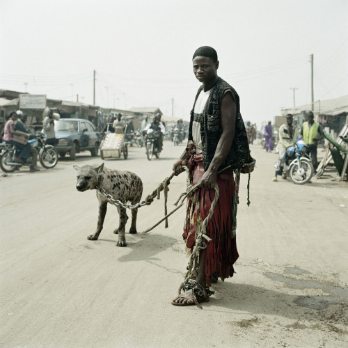 titytwochainz:  hip-hop-quest:  liftedandgiftedd:  keepbangin:  cenobiteme:  Nigeria’s Hyena Men by photographer Pieter Hugo   thats dope  this is raw as fuckk  real thugs  fuck yo pit bull 