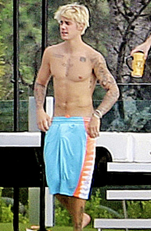 male-celebs-naked:  fuckstar:  wicked95:  boytrappedinthcloset:  Justin Bieber’s bulge, booty and his giant dick  
