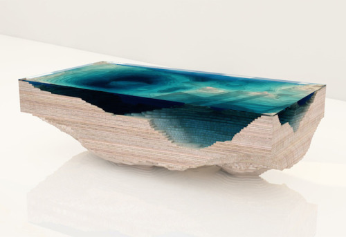 culturenlifestyle:  Stunning Table Displays the Ocean AbyssDesigned by the London based furniture design company Duffy London, the Abyss Table beautifully resembles the ocean’s depth and liquid texture with the aid of wood and sea-foam colored glass.