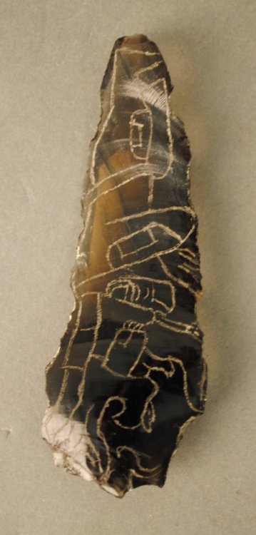 mostly-history:Obsidian flakes, engraved with figures of Maya deities (Tikal,Guatemala, date unknown