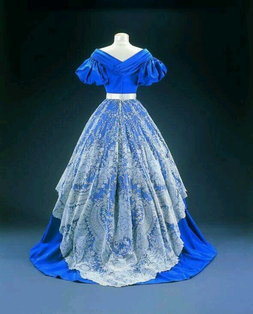 fashionologyextraordinaire:Romantic era of fashion Cobalt blue crinoline gown with lace adornment Ca