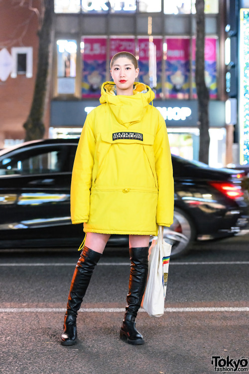 Japanese hair stylist Sayaka on the street in Harajuku. In addition to her shaved hairstyle, she&