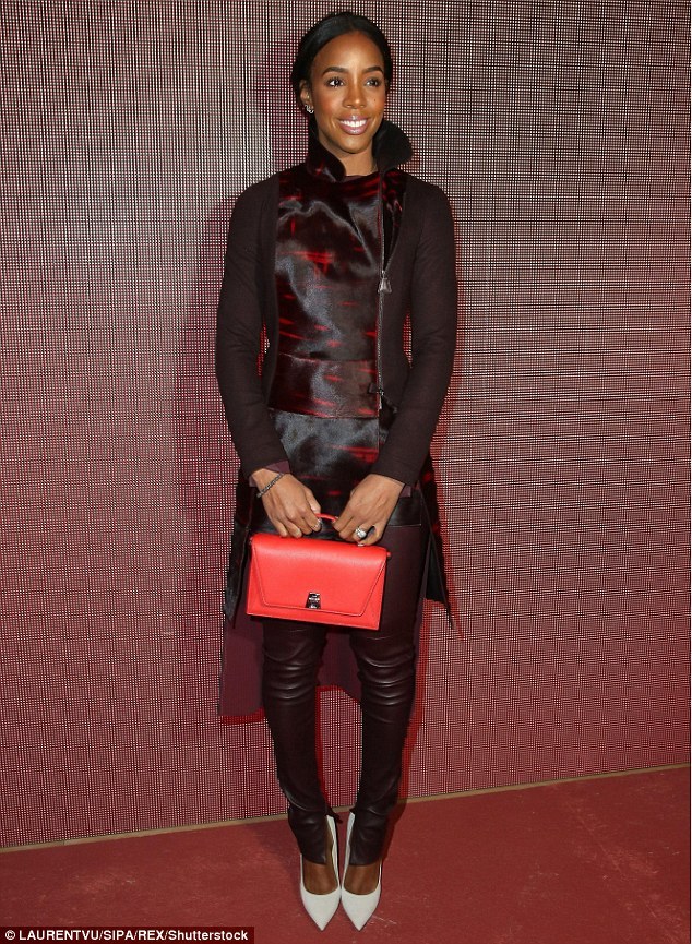 missladylove20:  Kelly Rowland sports form-fitting leather at the Akris Paris Fashion