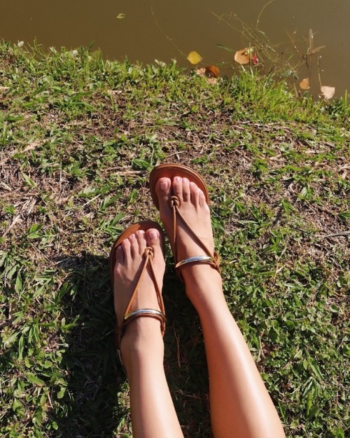 Sandals sunning by the lake.