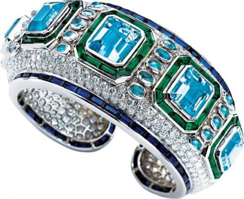 jeweliciousness: Aquamarines, Emeralds, Moonstones, Sapphires &amp; Diamonds make up this cuff/b