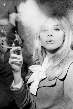 sharontates:  Britt Ekland smoking a cigar at a London Exhibition, 1966