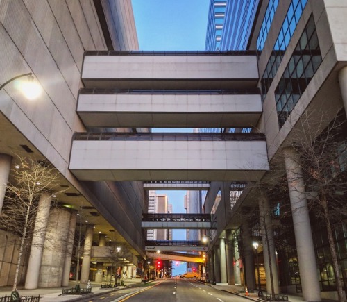 atlantathecity:  The architecture of John Portman in Downtown Atlanta. I’m glad he gave us interesting geometry to look at above our heads. It distracts from the lack of anything happening at street level. One shouldn’t speak ill of the recently deceased