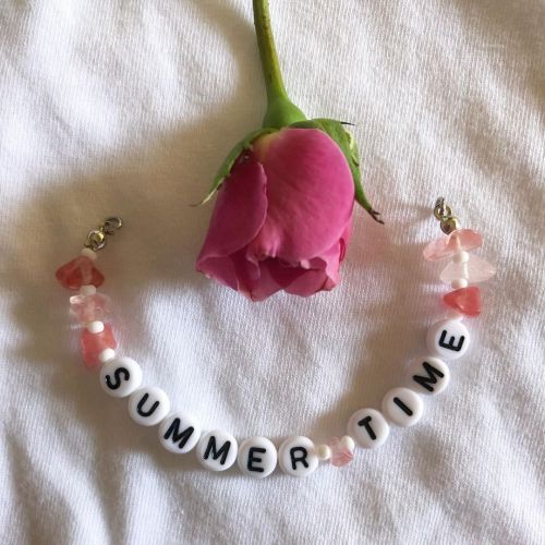 Summer time necklace (well, actually, a part of a necklace) with rose quartz and resin letters. Flow
