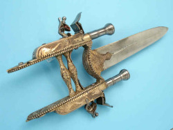 peashooter85:  Rare brass handled katar dagger mounted with two flintlock pistols, originates from India, 18th or early 19th century.