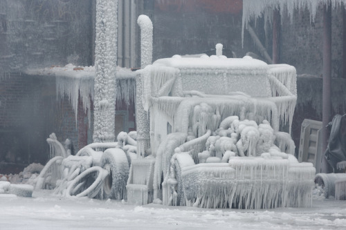 devidsketchbook:  FIRE AND ICE Chicago-based Photographer David Schalliol The Frozen Aftermath of a Chicago Warehouse Fire. Temperatures were so low during the fire that water sprayed on the building froze almost instantly leaving behind a spectacularly