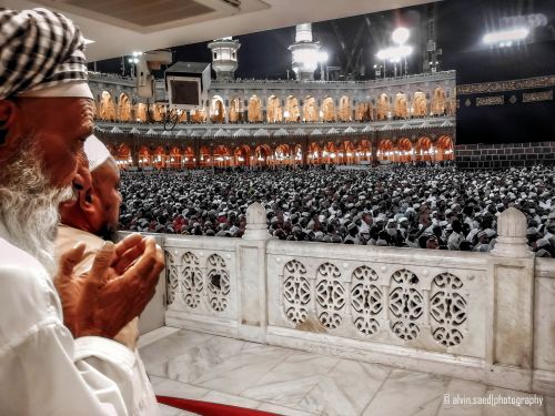 Man Making Dua at Masjid al-Haram [Nighttime Photo]www.IslamicArtDB.com » Islamic Architecture » Saudi Arabia » Makkah (Mecca), Saudi Arabia » al-Masjid al-Haram in Makkah, Saudi Arabia » The Ka`ba