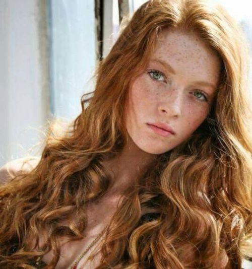 silentorgasm: Stunning freckles.  I love the waves and curls to her hair…just imagine th