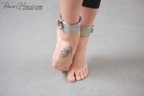 fuckiamsexedout:Steel shackles close up and Alexandra’s cute feet - (tags: barefoot, jewelry for slaves, polished steel cuffs, 24/7)-from http://www.ballet-heels.com/