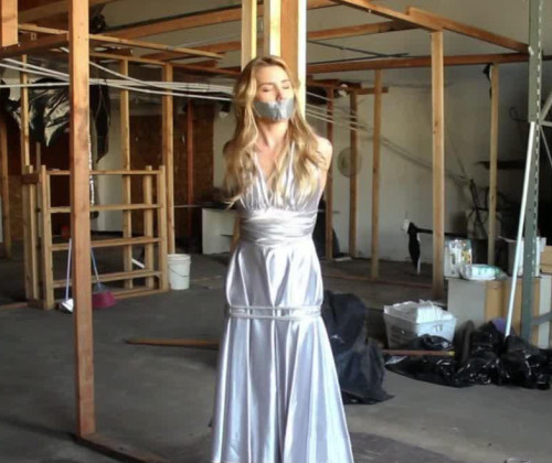 stoneyflake:  Blonde in silky dress tied to a post in an abandoned building. Perfect.