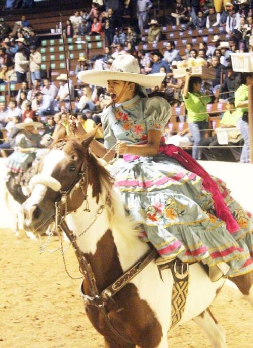 sartorialadventure:Some kickass Mexicanas participating in una charreada (click to enlarge)The charr