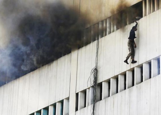 losed: People falling/jumping from a high floor of a burning building in central