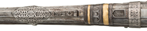 A silver decorated matchlock musket, 18th century.Rock Island Auction says its from the Mediterranea