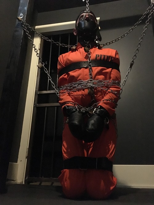 seabondagesadist:  The prisoner came to visit for some heavy bondage and captivity. After processing he found himself in orange, tape gagged, muzzled, shackled, mittens, chained and strapped in heavy bondage for several hours… 