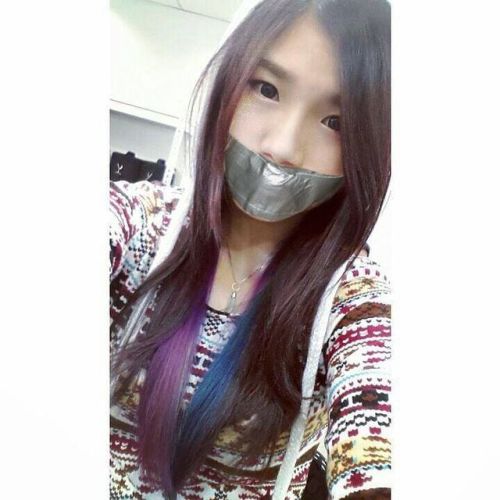 Asian girl fake tape gagged Tape gagged girl