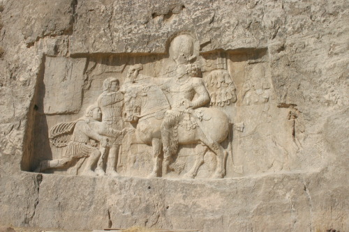 Relief of King Shapur I capturing Roman emperor Valerian . 