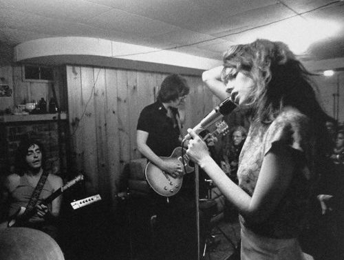 theunderestimator-2:  Rehearsal time for Destroy All Monsters back in late spring ‘77 in their hometown of Ann Arbor (former MC5 bassist Michael Davis, former Stooges guitarist Ron Asheton and Niagara in vocals), as captured by Sue Rynski.(via)
