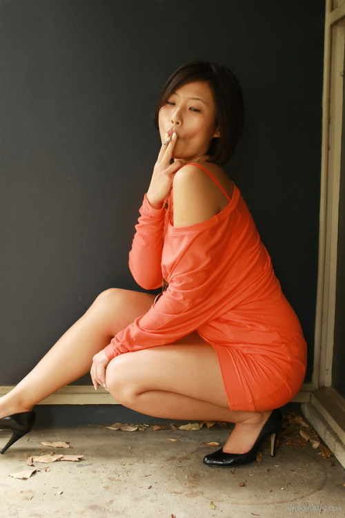 Beautiful Asian smoker from randomsnaps Annie sucking hard on her cigarette perfect cheek hollowing 