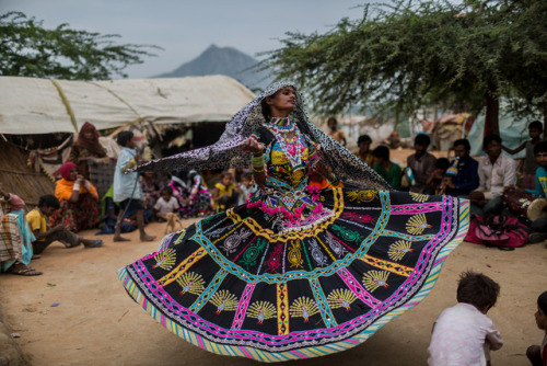 global-musings:A Kalbelia nomad woman dancing the sapera which is said to resemble the twirls of a s