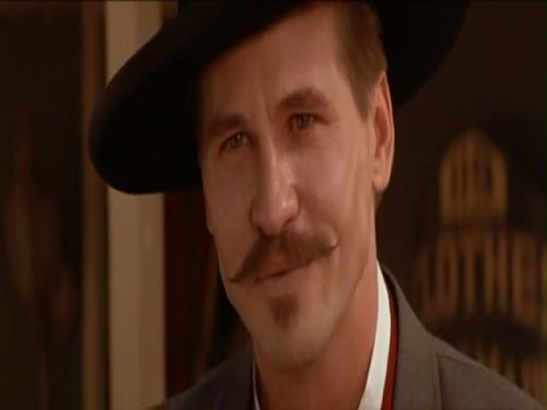 thatdamnspartan-deactivated2016:  Val Kilmer as John “Doc” Henry Holliday in “Tombstone” (1993) 