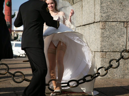 bestofvoyeur:  Bride upskirt in sexy thong and stockings /  Suspender! like it!