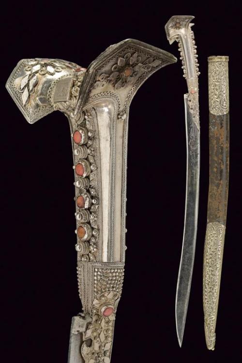 Silver and red coral mounted yatagan, Turkish, 19th century.from Czerny’s International Auction Hous