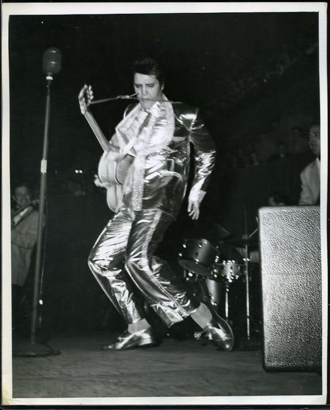 ilovetheking-elvispresley:  Random photo’s of Elvis with his gold suit :) 
