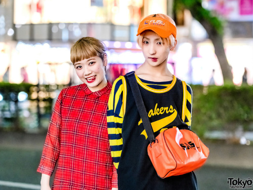 tokyo-fashion:  Always fun Karin and P-Chan from the Japanese dance group Tempura Kidz on the street in Harajuku at night wearing colorful looks with items from FUBU x Versace (Freak City), Lakers, Dr. Martens, Adidas, and SAS. Full Looks