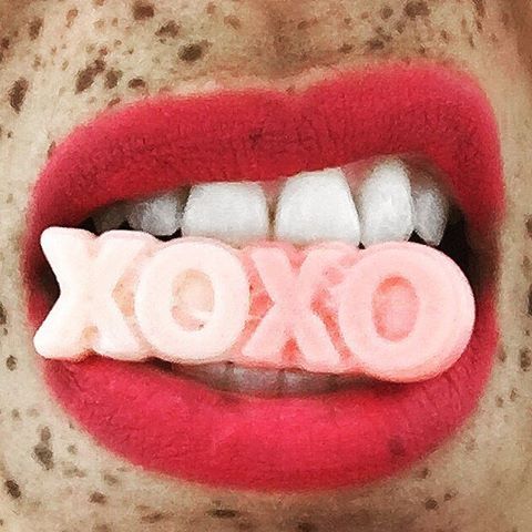 Love me? Getting naughty in the candy shop. In my mouth @sockerbitnyc and @katvondbeauty on my lips.