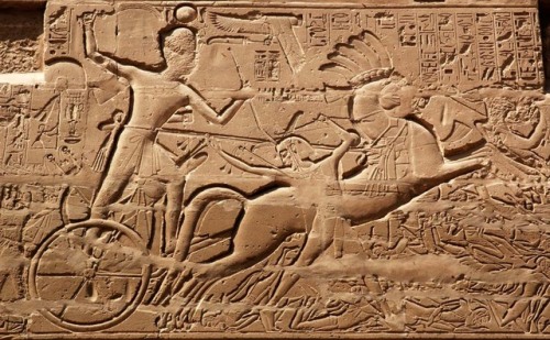 Seti I (the father of Ramesses II, pharaoh 1294-1279 BCE) fights the Libyans from a chariot. He repe