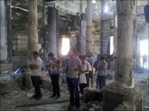 alwaysabeautifullife:fatherangel:Young Coptic Christians praying in their church which was burned. T