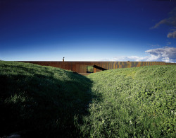 enochliew:  Glenburn House by Sean Godsell It is partially embedded into the hilltop to protect the occupants from the prevailing weather and buffer the west side of the building from extreme heat in summer. 